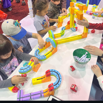 MagicRailCube: Interaktives Schienenbauspielzeug für frühkindliches Lernen